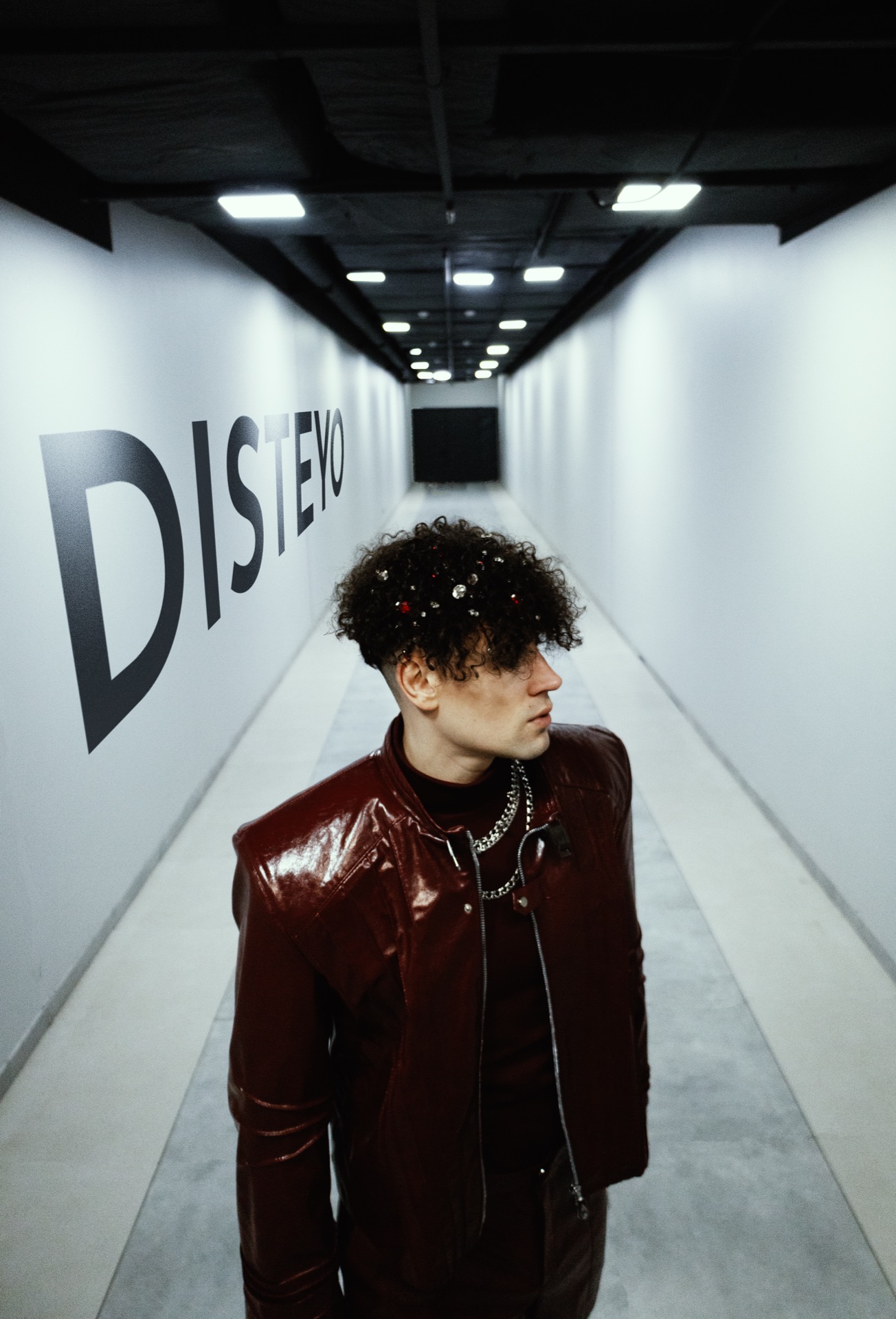 DISTEYO corridor photoshoot — atmospheric urban setting
